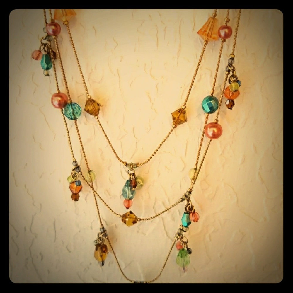 Beaded necklace multistrand light